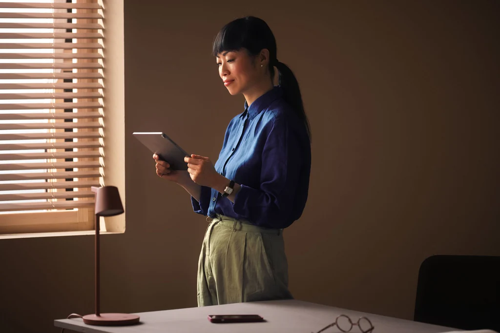 Hotel manager reviewing the schedule on a tablet